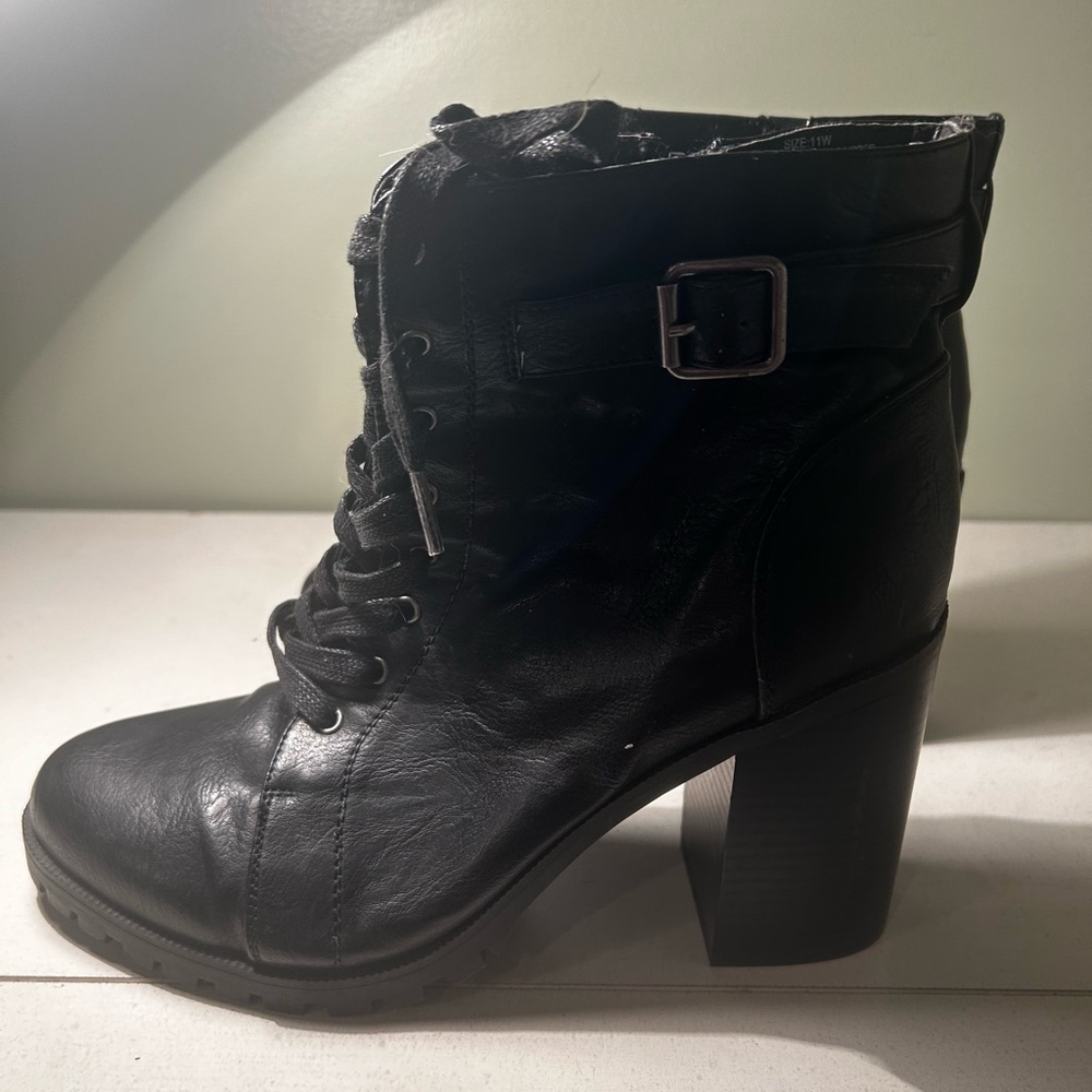 Torrid heeled combat boots